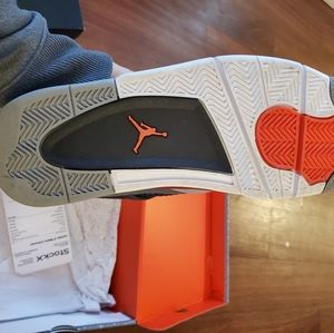 Air Jordan 4 Retro size 9.5 grey and red